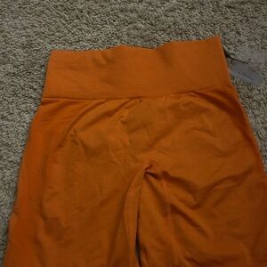 NVGTN Women's Orange Bike Shorts